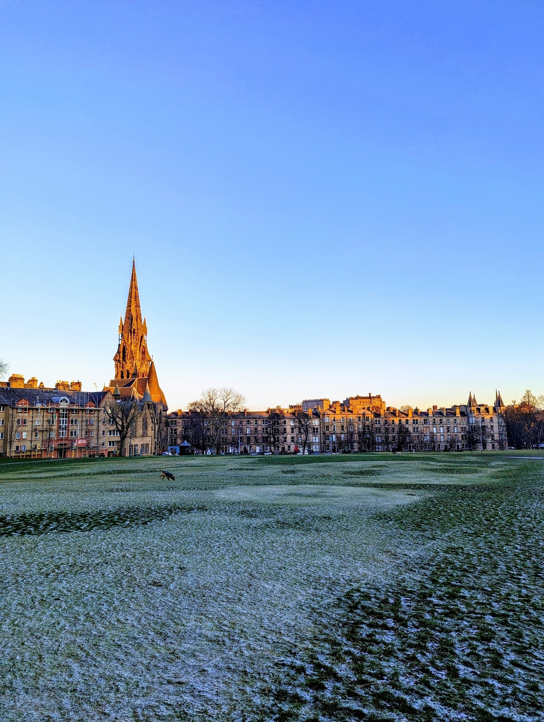 Sunlight across the meadows on Edinburgh castle